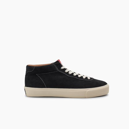 Black sneaker with white laces on a white background